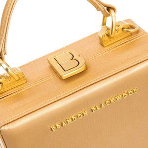 MINI KENDRICK TRUNK GOLD TAN SATIN